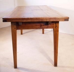 French antique cherry double extending table C 1820 end elevation