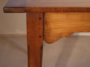 French antique style cherry table with bracketed frame chamfered leg and bracket